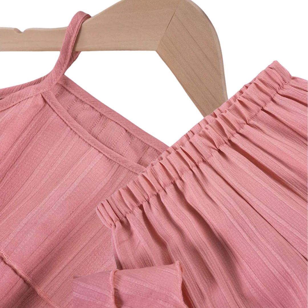 Conjunto de dos piezas para niñas color salmón